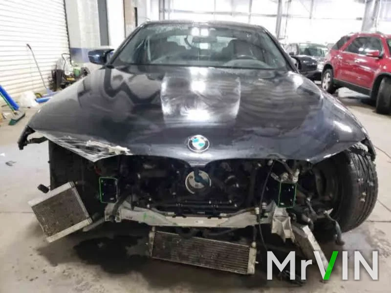 A BMW M5 with a destroyed front end