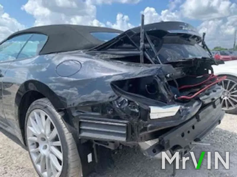 A Maserati GranTurismo convertible with a crushed rear
