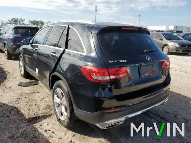A black Mercedes GLC with no visible damage at a salvage auction