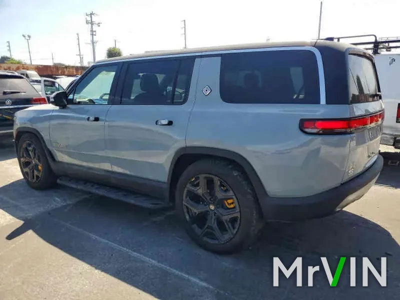 A grey Rivian R1S with no visible damage