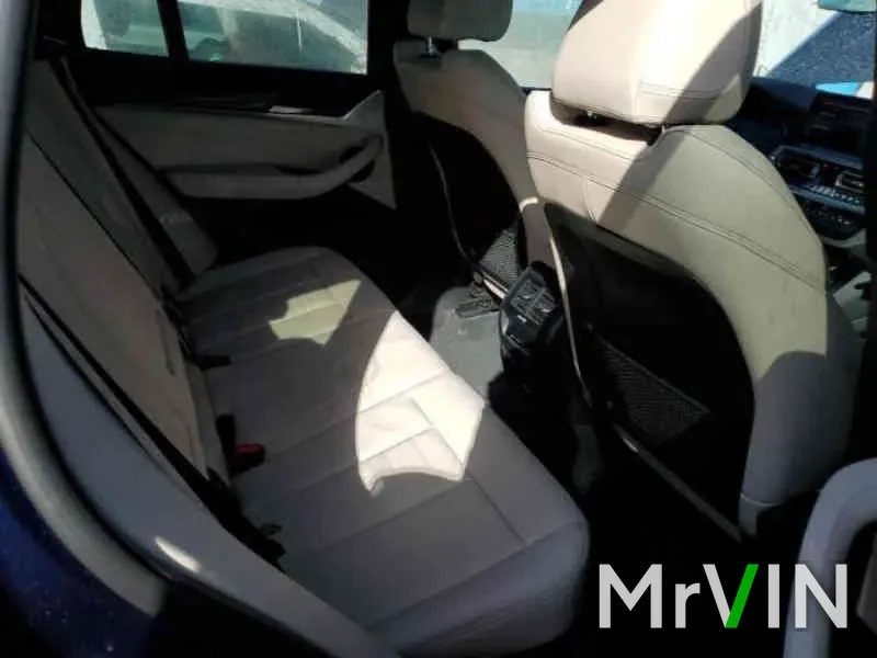 The clean rear seats of the X3 from the side