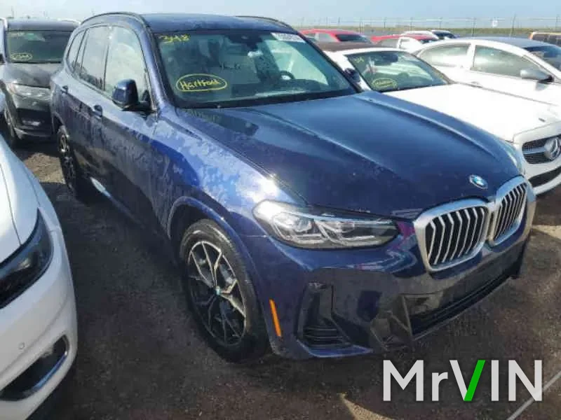 A blue 2024 BMW X3 with no visible damage at a salvage auction